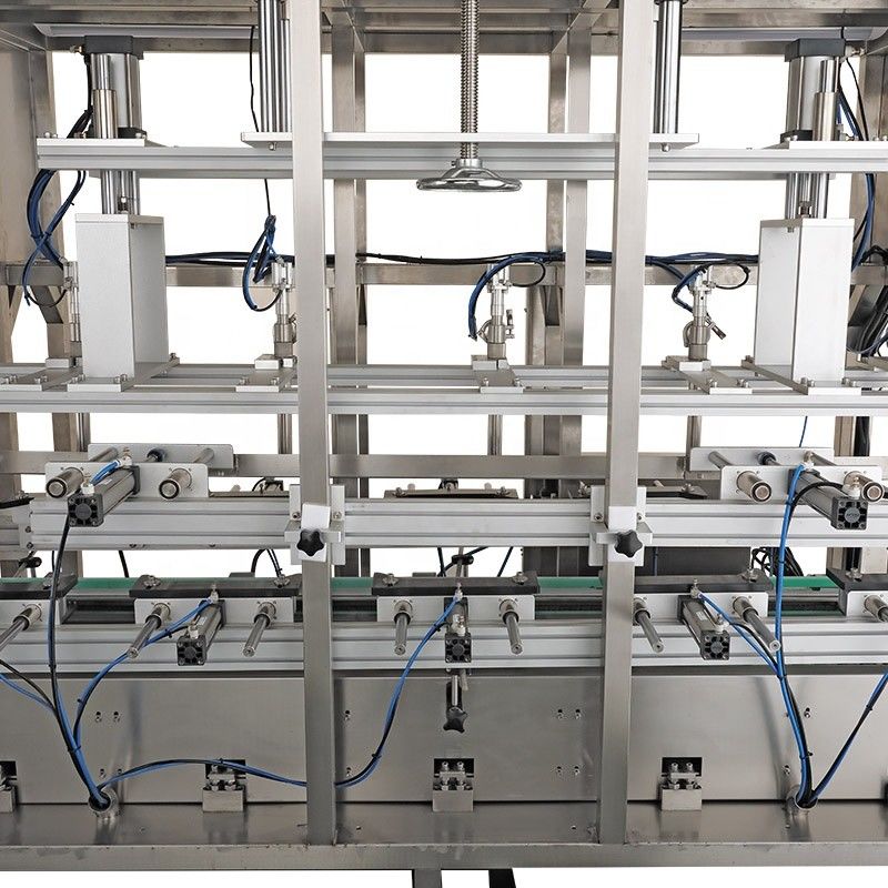 Paper Packaging Material 5 Nozzle Automatic Liquid Filling Machine for Chemical Products