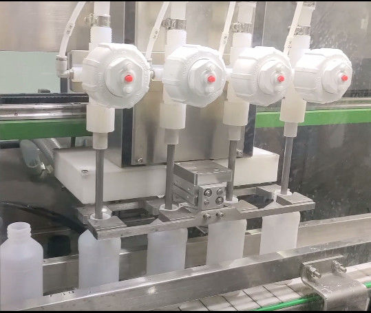 High Speed 4 Heads Liquid Bottle Filling Capping Labeling Machine for Plastic Bottles